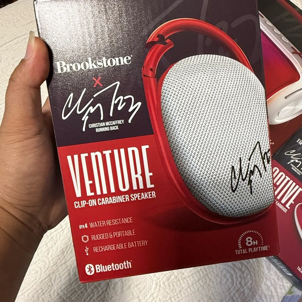 New Brookstone Prime Set of 4! Speaker, headphones, clip on speaker, earbuds!